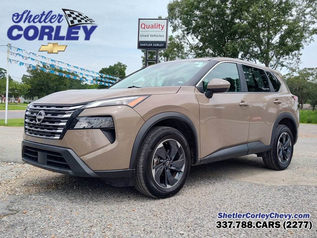 2025 Nissan Rogue SV in Tan — front three-quarter view